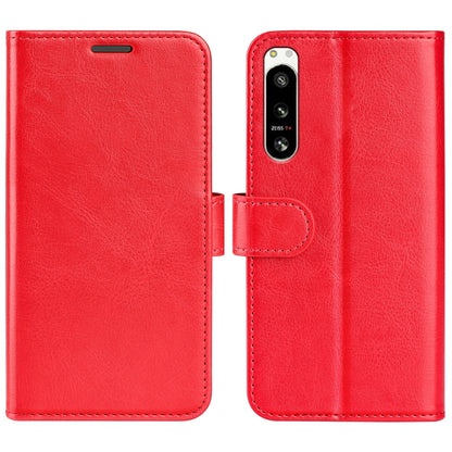 Red textured horizontal flip leather phone case with camera cutout and strap