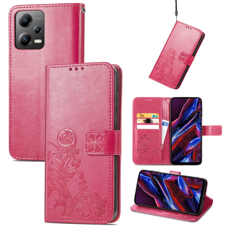 Pink leather phone case with embossed clover floral design, folio wallet and card holder