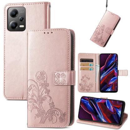 Light pink leather phone case with embossed clover floral design, folio wallet with card slots
