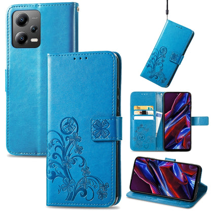 Blue leather phone case with embossed clover floral design, folio wallet with card slots
