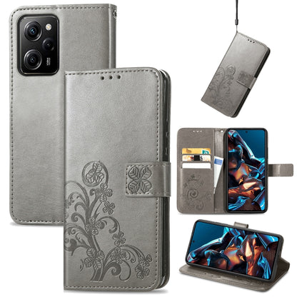 Gray leather phone case with embossed clover floral design, folio wallet with card slots
