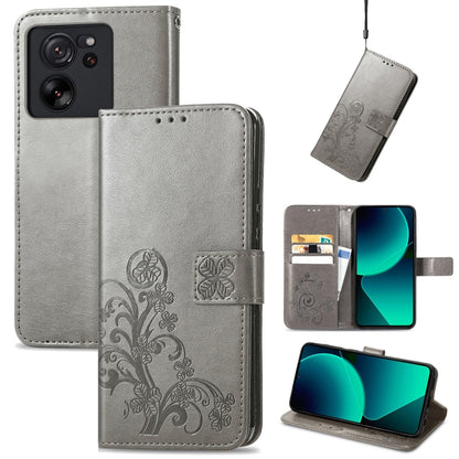 Gray embossed leather folio phone case with four-leaf clasp and card-slot cutouts