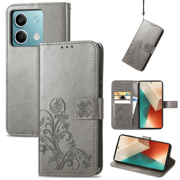 Gray embossed leather wallet phone case with four-leaf clasp and card slots