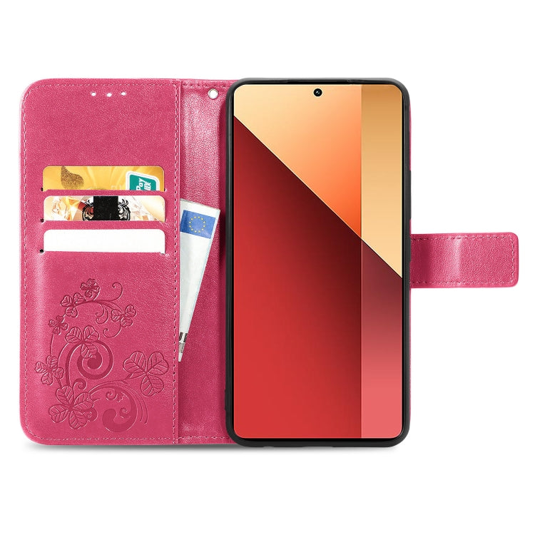 Magenta embossed leather phone wallet case with flip cover, card slots, and four-leaf design