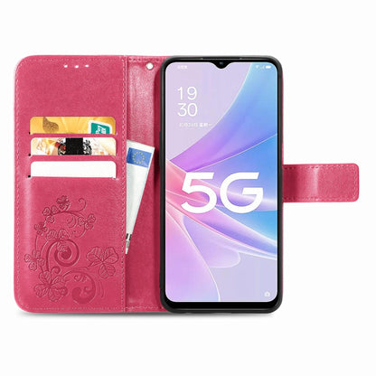 Magenta embossed leather phone case with clasp buckle, card holder windows, phone in place