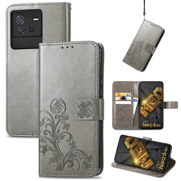 Gray leather wallet phone case with floral embossed clasp and card slots