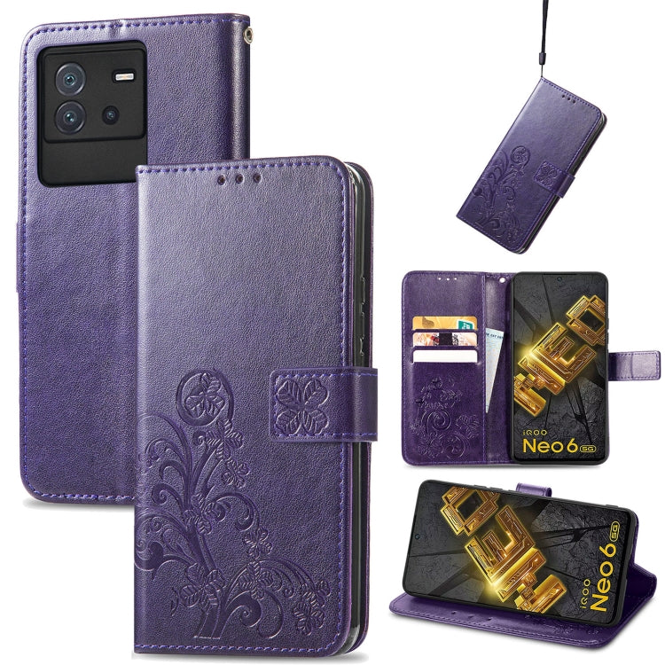Purple leather wallet phone case with floral embossed clasp and card slots