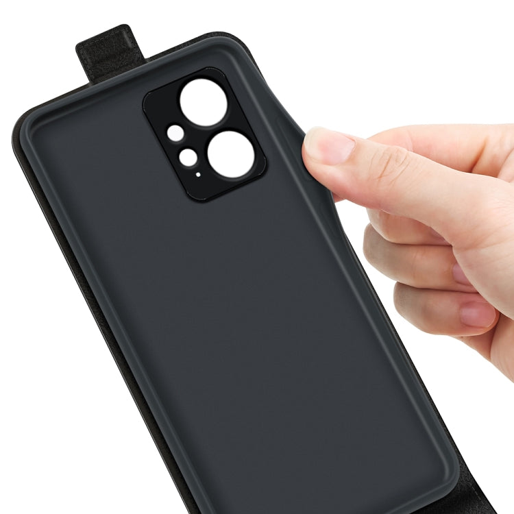 Black leather phone case back with camera cutout, held by hand.