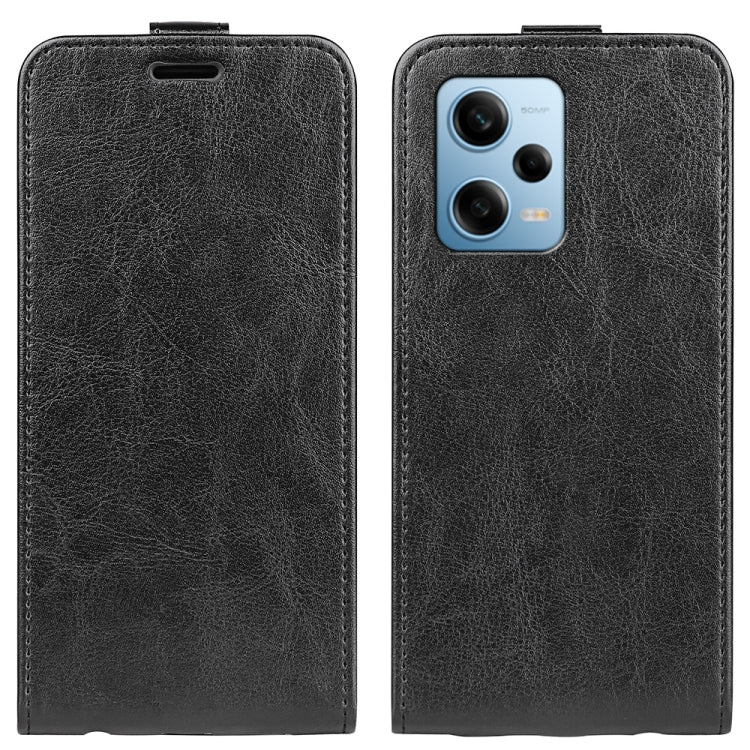 Black textured leather flip phone case with phone camera cutout and card slot