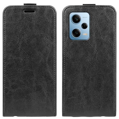 Black textured leather flip phone case with phone camera cutout and card slot