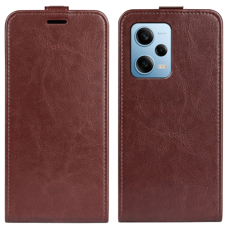 Brown textured leather flip phone case with camera cutout and top speaker hole
