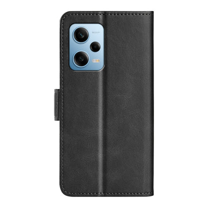 Black leather flip phone case with camera cutout and magnetic side strap.