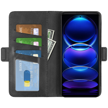 Black leather wallet flip phone case with card slots and kickstand, phone screen visible.