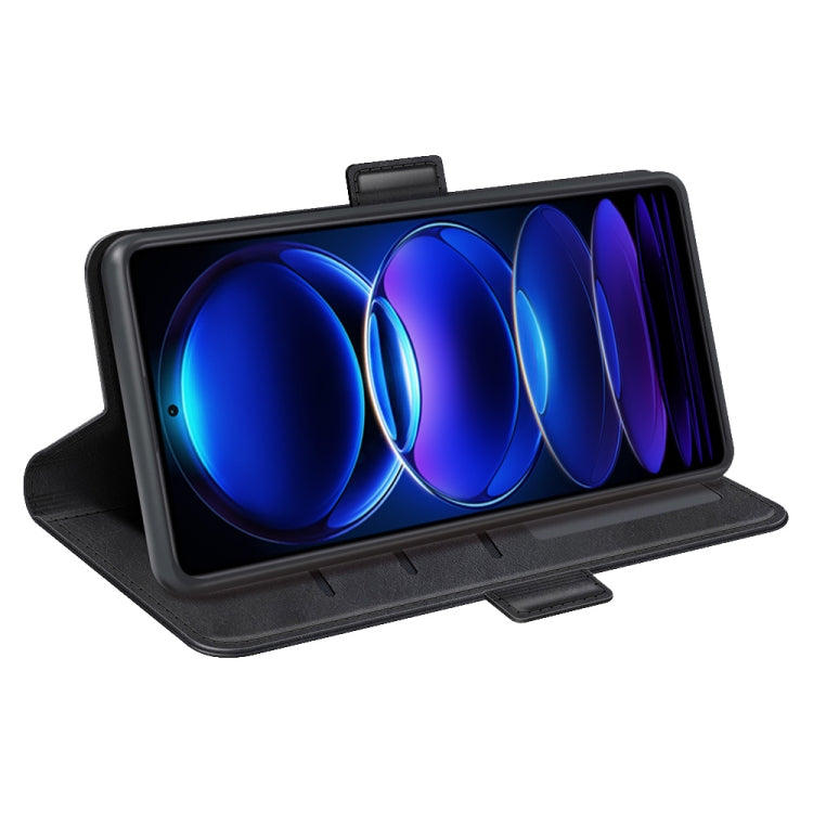 Black leather folio flip phone case with stand, holding phone at an angle.