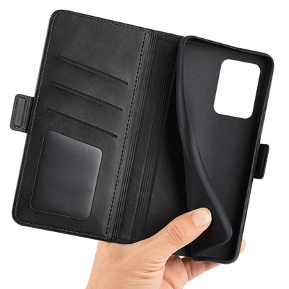 Black leather flip phone case with inner card slots and hand holding open cover.
