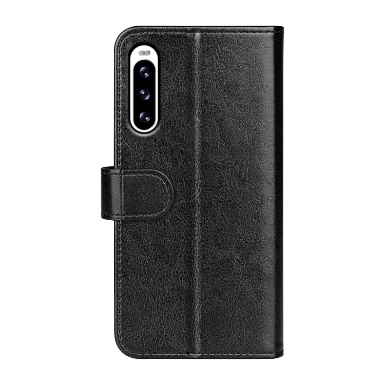 Black horizontal flip leather phone case with camera cutout and magnetic closure