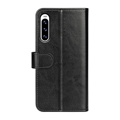 Black horizontal flip leather phone case with camera cutout and magnetic closure