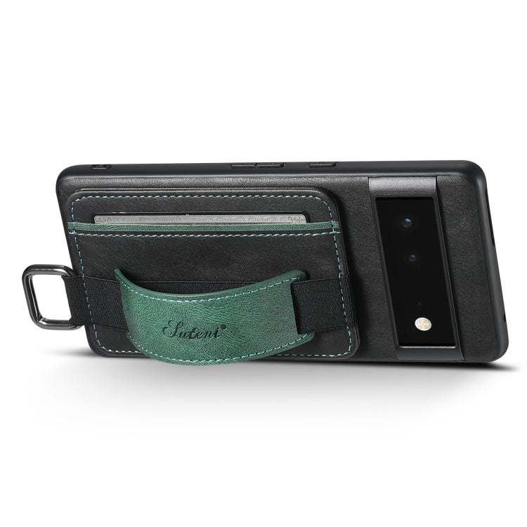 Green card wallet phone case with wrist strap ring, shown in side profile.