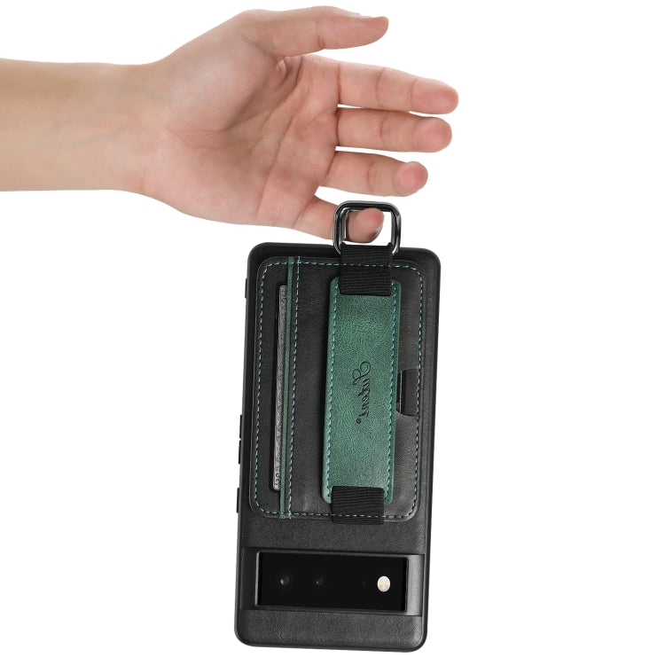 Black PU phone case with green card holder and wrist strap ring, held up.