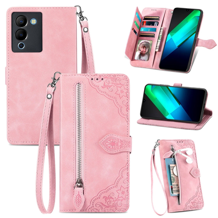 Rose pink embossed flower leather phone case with wrist strap, zipper, and card holder