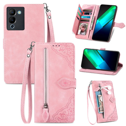Rose pink embossed flower leather phone case with wrist strap, zipper, and card holder