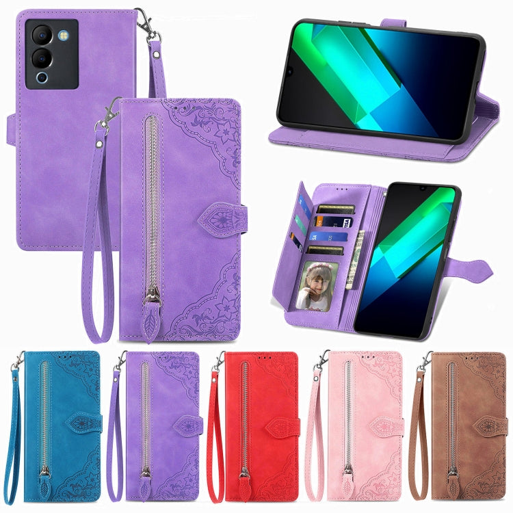 Purple embossed flower leather phone case with zipper, card slots, and wrist strap (set shown)