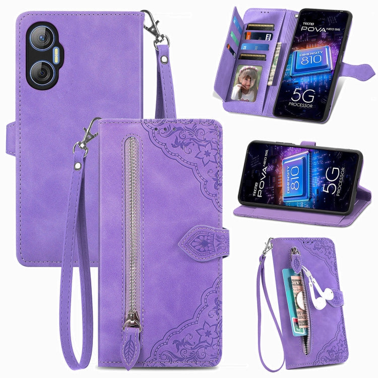 Purple embossed floral leather-style phone case with front zipper and wrist strap
