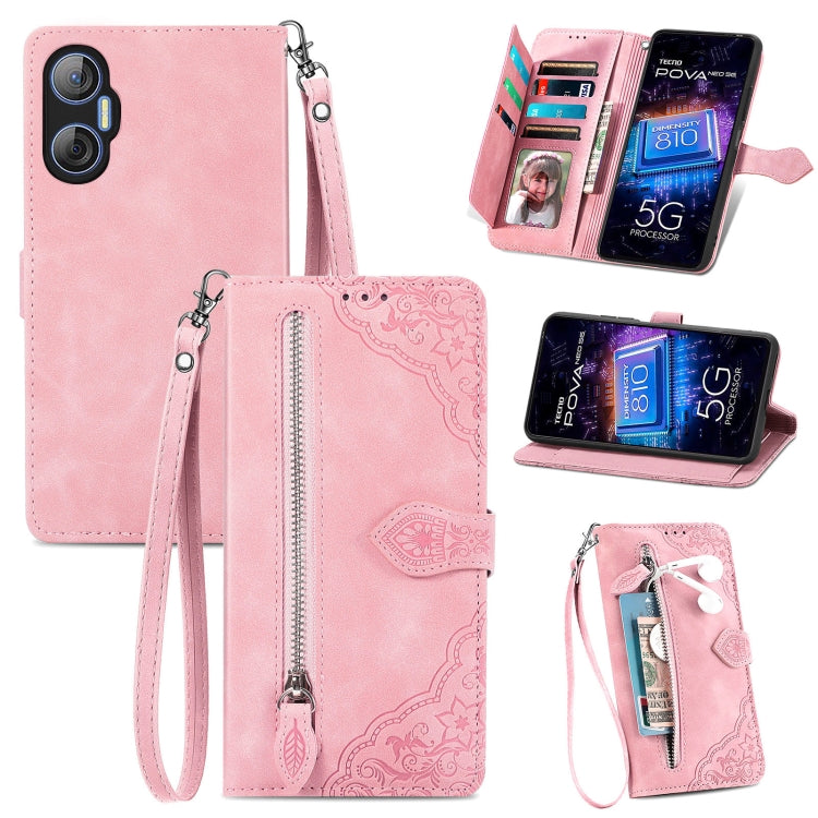 Rose pink embossed flower leather phone case with zipper, card slots, and wrist strap