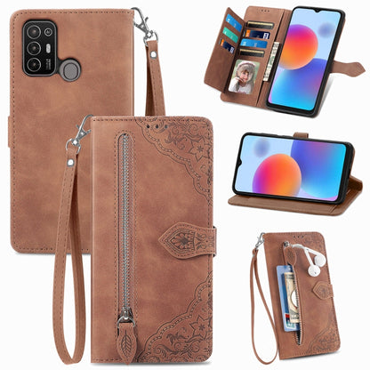 Brown embossed flower leather phone case with zipper pocket and wrist strap