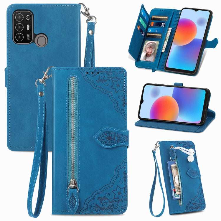 Blue leather phone wallet case with embossed floral pattern, zipper and wrist strap, card slots.
