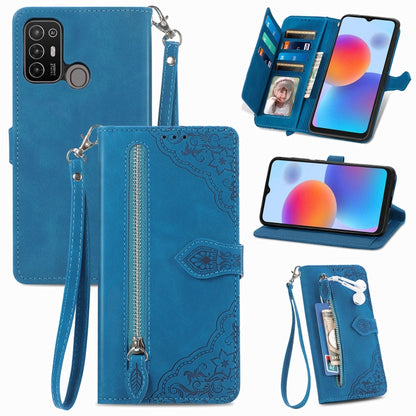 Blue leather phone wallet case with embossed floral pattern, zipper and wrist strap, card slots.