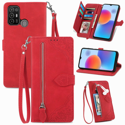 Red embossed floral leather-style phone case with front zipper and detachable wrist strap