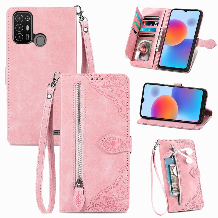 Pink embossed flower leather phone case with wrist strap and zippered front pocket