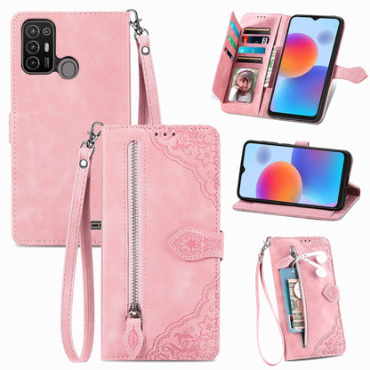 Pink embossed flower leather phone case with wrist strap and zippered front pocket