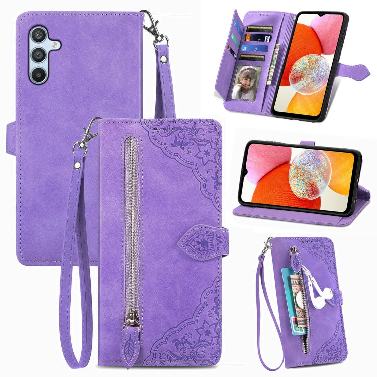 Purple embossed floral leather-style phone case with front zipper, strap, and card slots