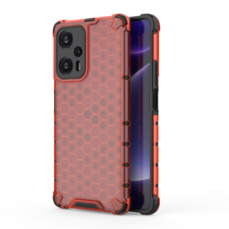 Shockproof honeycomb phone case in orange-red with hex pattern and raised camera cutouts