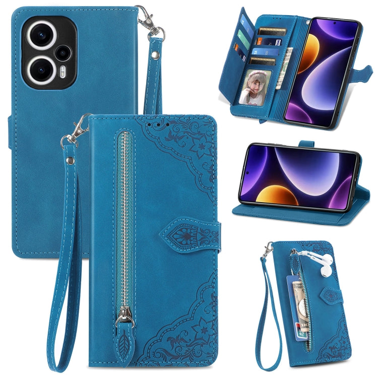 Blue embossed leather phone case with zipper, wrist strap, and card slots