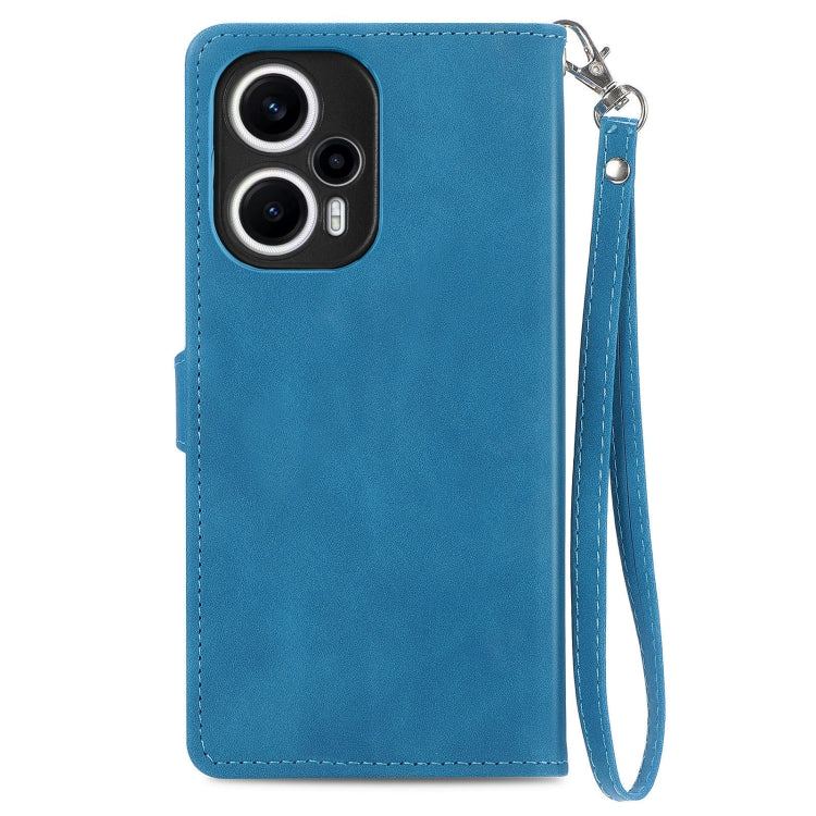 Blue leather phone case with wrist strap and cutouts for camera module