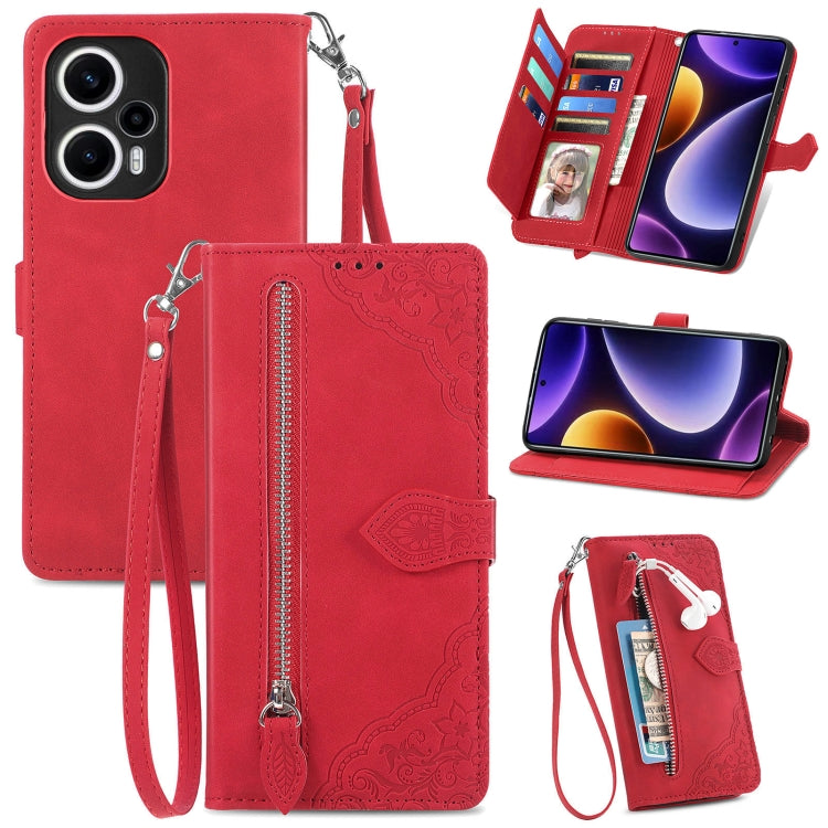 Red embossed leather phone case with zipper pocket and wrist strap