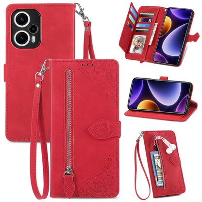 Red embossed leather phone case with zipper pocket and wrist strap