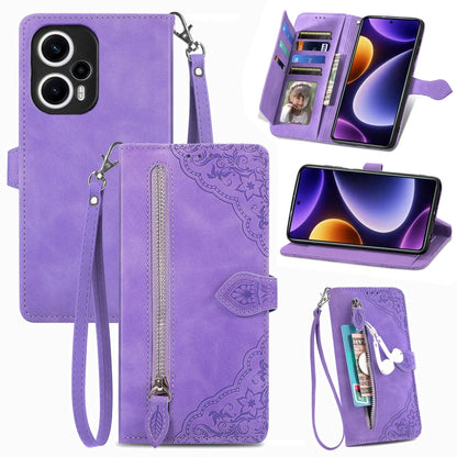 Purple embossed leather phone case with zipper pocket and wrist strap