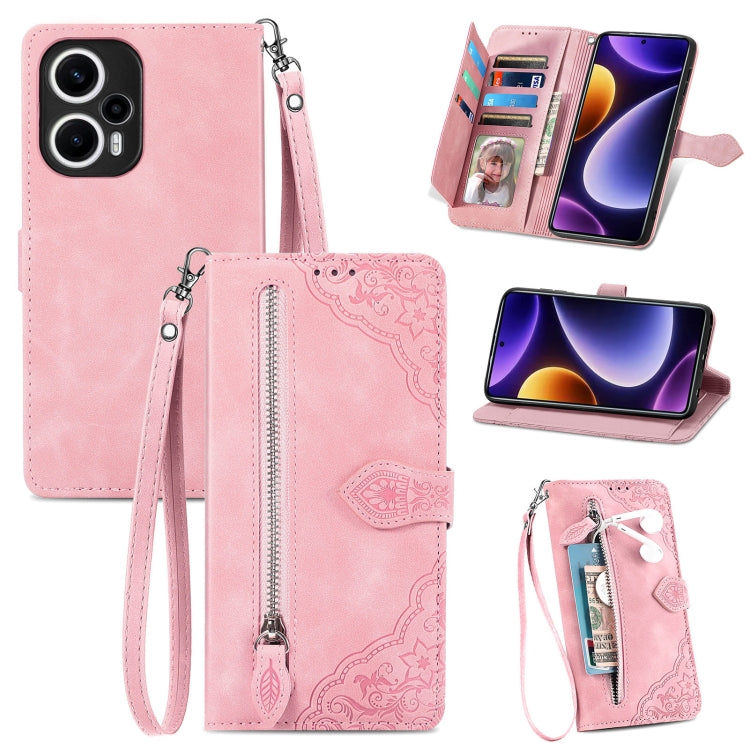 Pink embossed leather phone case with zipper pocket and wrist strap