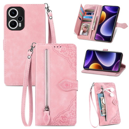 Pink embossed leather phone case with zipper pocket and wrist strap
