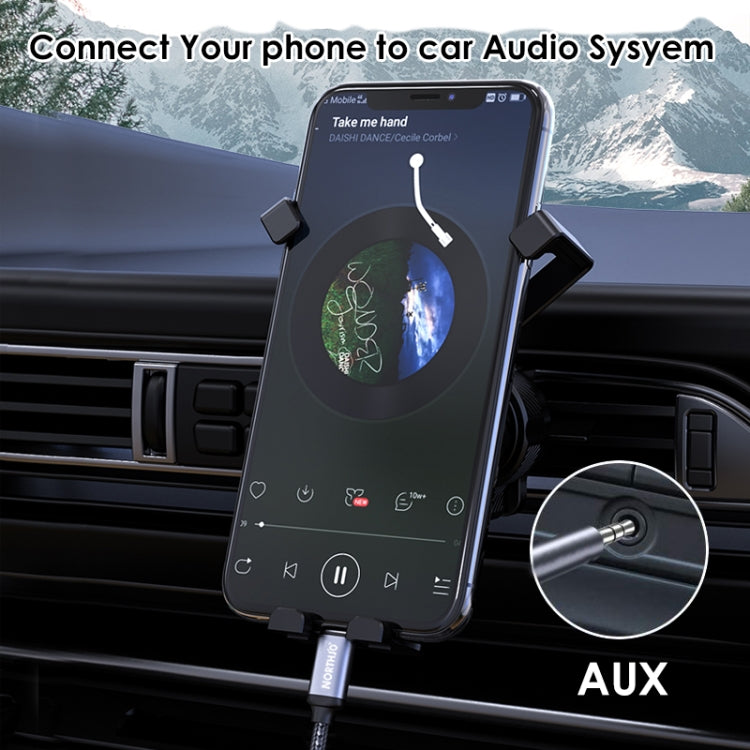 USB-C to 3.5mm audio aux cable connection with visible plugs for phone audio