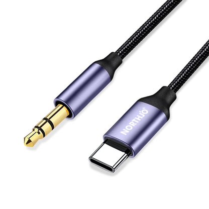 3.5mm gold plug and USB-C connector on braided aux cable with blue metal body
