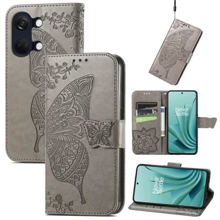 Gray embossed leather phone case with butterfly and floral pattern, flip cover and strap.