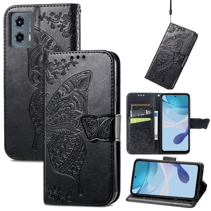 Black embossed leather wallet phone case with butterfly-and-flower relief and strap