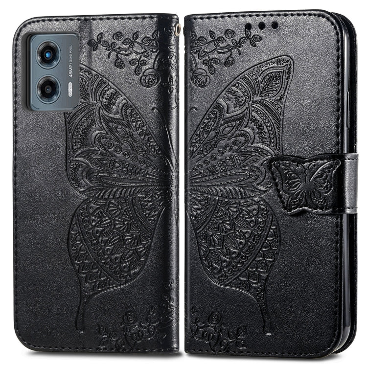 Black embossed leather flip phone case with butterfly-and-flower relief and clasp