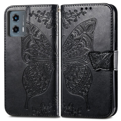 Black embossed leather flip phone case with butterfly-and-flower relief and clasp