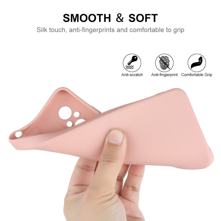 Pink liquid silicone phone case with raised cutouts and soft grip texture